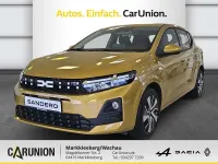 Neu Dacia Sandero Expression 101 PS (74 kW) 2026 Amber yellow Limousine