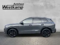 Gebraucht VW Tiguan Style 265 PS (194 kW) 2024 Delfingrau metallic SUV