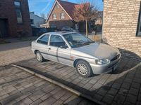 Używany Ford Escort 90 KM (66 kW) 1995 Srebrny Sedan/Limuzyna