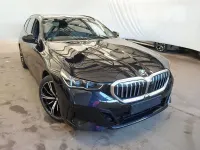Gebraucht BMW 520 M Sport 190 PS (139 kW) 2025 Carbonschwarz (schwarz) Kombi