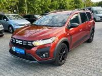 Gebraucht Dacia Jogger Extreme 94 PS (69 kW) 2024 Terracottabraun (metallic) Van / Kleinbus