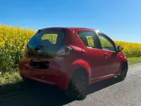 Gebraucht Toyota Aygo 68 PS (50 kW) 2010 Rot Kleinwagen