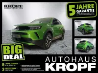 Gebraucht Opel Mokka Elegance 131 PS (96 kW) 2024 Lackierung matcha green/typ au SUV