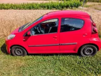 Gebraucht Peugeot 107 Active 68 PS (50 kW) 2012 Rot Kleinwagen