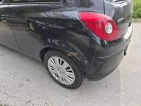 Używany Opel Corsa Edition 80 KM (58 kW) 2009 Czarny Hatchback