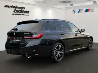 Gebraucht BMW 330e M Sport 292 PS (214 kW) 2024 Black sapphire metallic Kombi
