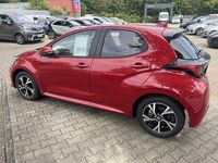 Gebraucht Toyota Yaris Hybrid Comfort 116 PS (85 kW) 2024 Karminarot metallic