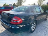 Używany Mercedes E220 150 KM (110 kW) 2004 Czarny Sedan/Limuzyna