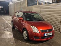 Gebraucht Suzuki Swift 92 PS (67 kW) 2010 Orange Kleinwagen