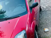 Gebraucht Ford Fiesta 75 PS (55 kW) 2007 Rot Kleinwagen