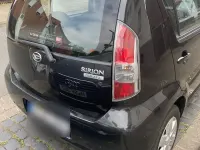 Gebraucht Daihatsu Sirion 71 PS (52 kW) 2007 Schwarz Kleinwagen