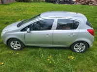 Używany Opel Corsa Eco 86 KM (63 kW) 2010 Srebrny Hatchback