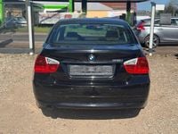 Second-hand BMW 318 129 CP (94 kW) 2007 Negru Berlinǎ