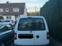 Używany VW Caddy 109 KM (80 kW) 2013 Biały Minivan