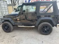 Gebraucht Jeep Wrangler Sahara 177 PS (130 kW) 1998 Schwarz SUV