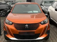 Gebraucht Peugeot e-2008 Active 100 kW (136 PS) 2023 Orange SUV