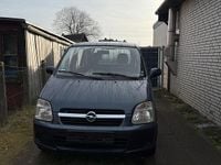 Używany Opel Agila 60 KM (44 kW) 2006 Niebieski Hatchback
