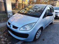 Second-hand Mitsubishi Colt Inform 75 CP (55 kW) 2006 Argintiu Berlinǎ