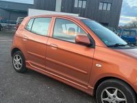 Gebraucht Kia Picanto 65 PS (47 kW) 2005 Orange Kleinwagen