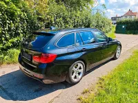 Gebraucht BMW 320 184 PS (135 kW) 2012 Schwarz Kombi