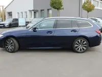 Gebraucht BMW 330 Comfort Edition 286 PS (210 kW) 2023 Tansanitblau ii metallic Kombi