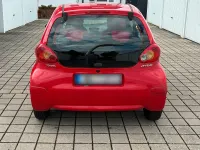 Gebraucht Toyota Aygo 68 PS (50 kW) 2008 Rot Kleinwagen
