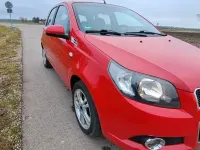 Gebraucht Chevrolet Aveo LT 101 PS (74 kW) 2011 Rot Limousine