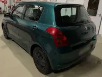 Używany Suzuki Swift 92 KM (67 kW) 2006 Zielony Hatchback