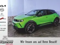 Gebraucht Opel Mokka-e 100 kW (136 PS) 2023 Ikone grün metallic SUV