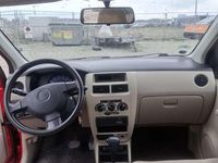 Gebraucht Daihatsu Cuore Plus 58 PS (42 kW) 2006 Rot Kleinwagen