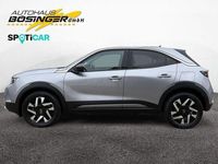 Gebraucht Opel Mokka-e Elegance 100 kW (136 PS) 2022 Kontrast grau/quarz silber SUV
