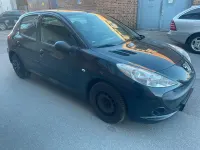 Gebraucht Peugeot 206+ 80 PS (58 kW) 2012 Schwarz Kleinwagen