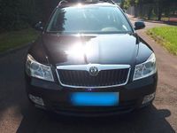 Second-hand Skoda Octavia Ambiente 122 CP (89 kW) 2011 Negru Break