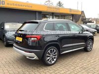 gebraucht Skoda Karoq Scout 1.5l TSI DSG / NAVI / ACC / PANO/SD