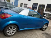 Używany Opel Tigra Cosmo 90 KM (66 kW) 2004 Niebieski Kabriolet
