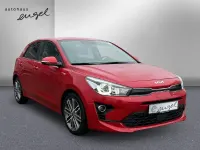 Gebraucht Kia Rio Platinum Edition 120 PS (88 kW) 2023 Signal rot metallic Limousine