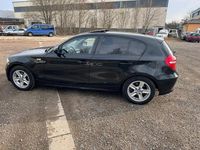 Gebraucht BMW 116 122 PS (89 kW) 2009 Schwarz Kleinwagen