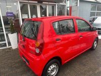 Gebraucht Daihatsu Cuore 69 PS (50 kW) 2009 Rot Kleinwagen