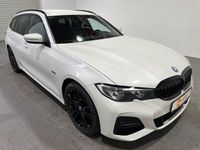 Gebraucht BMW 330e M Sport 252 PS (185 kW) 2021 Mineralweiss Kombi