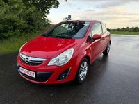 Second-hand Opel Corsa Satellite 69 CP (50 kW) 2011 Roșu Hatchback