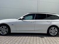 Gebraucht BMW 330e Efficient Dynamics 292 PS (214 kW) 2022 Alpinweiß uni Kombi
