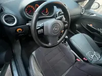 Używany Opel Corsa 75 KM (55 kW) 2010 Czarny Hatchback