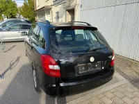 Używany Skoda Fabia 60 KM (44 kW) 2009 Czarny Kombi