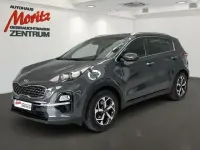 Gebraucht Kia Sportage Vision 177 PS (130 kW) 2020 H8g) pentametal met. (grau SUV