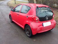 Gebraucht Toyota Aygo 68 PS (50 kW) 2006 Rot Kleinwagen