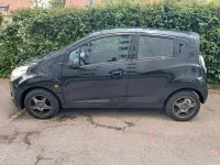 Gebraucht Chevrolet Spark 68 PS (50 kW) 2011 Schwarz Kleinwagen