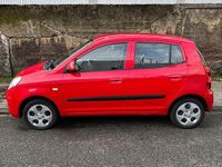 Second-hand Kia Picanto Attract 65 CP (47 kW) 2009 Roșu Hatchback