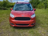 Gebraucht Ford Tourneo Courier Trend 101 PS (74 kW) 2015 Rot Van / Kleinbus