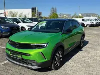Gebraucht Opel Mokka Elegance 136 PS (100 kW) 2023 Lackierung matcha green/typ au SUV