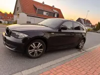 Gebraucht BMW 116 122 PS (89 kW) 2009 Schwarz Kleinwagen